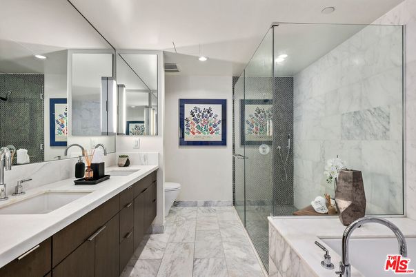 Bathroom, Dual Sink Vanities, Glass Shower, Interior, Marble, Marble Walls, Recessed Lighting