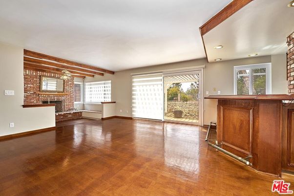 Empty room, Fireplace, Interior, Recessed Lighting, Stone Walls, Wooden Beams, Wood Texture Flooring