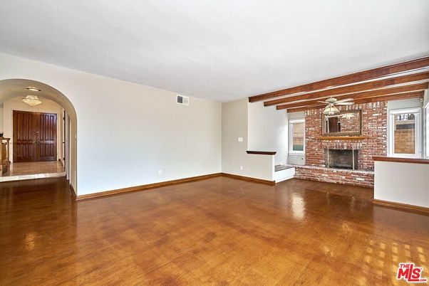 Empty room, Fireplace, Interior, Stone Walls, Wooden Beams, Wood Texture Flooring