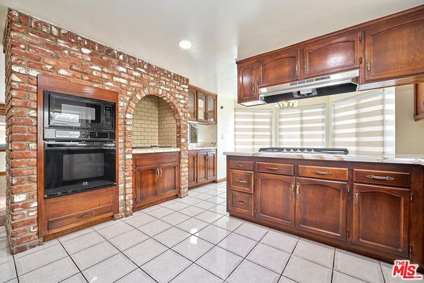 Interior, Kitchen, Recessed Lighting, Stone Walls, Tile Countertops
