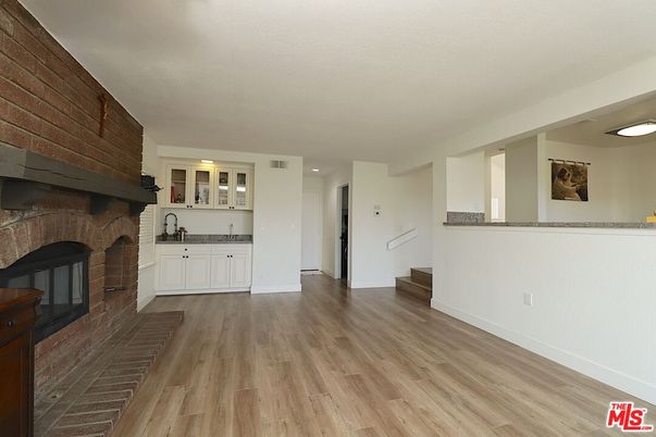 Fireplace, Interior, Recessed Lighting, Stone Walls, Wood Texture Flooring