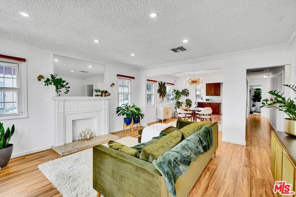 Dining room, Fireplace, Interior, Living room, Pendant Lights, Recessed Lighting, Wood Texture Flooring
