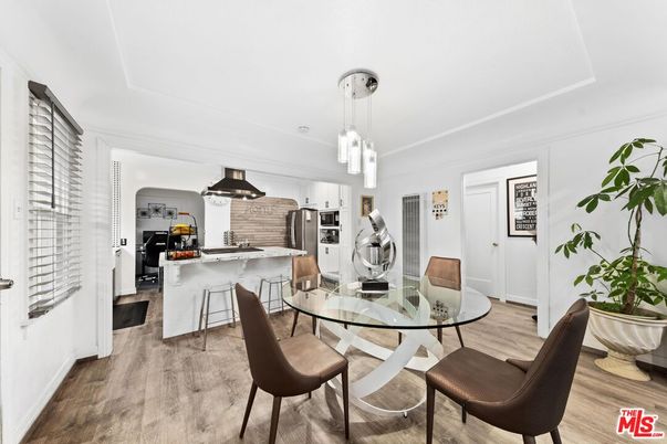 Dining room, Interior, Kitchen, Pendant Lights, Stainless Steel Appliances, Wood Texture Flooring