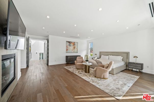 Bedroom, Fireplace, Interior, Living room, Recessed Lighting, Wood Texture Flooring