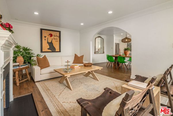 Dining room, Fireplace, Interior, Living room, Recessed Lighting, Wood Texture Flooring