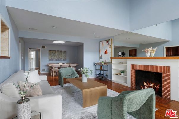 Dining room, Fireplace, Interior, Living room, Recessed Lighting, Wood Texture Flooring