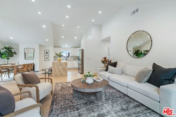 Dining room, Interior, Kitchen, Living room, Recessed Lighting, Stainless Steel Appliances, Wood Texture Flooring