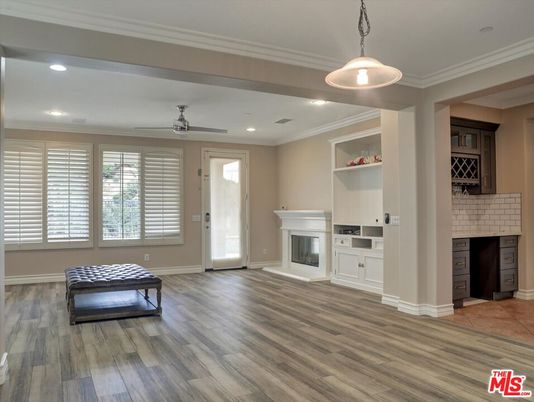 Fireplace, Interior, Pendant Lights, Recessed Lighting, Wood Texture Flooring