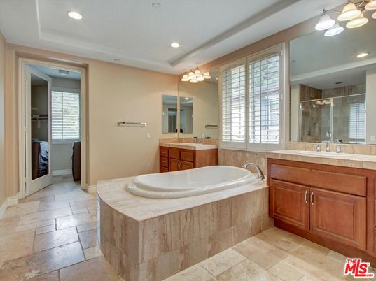 Bathroom, Dual Sink Vanities, Glass Shower, Interior, Recessed Lighting, Tile Countertops