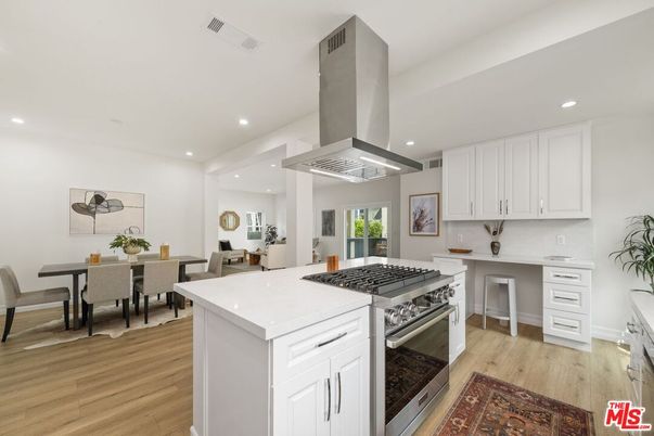 Dining room, Interior, Kitchen, Recessed Lighting, Stainless Steel Appliances, Wood Texture Flooring
