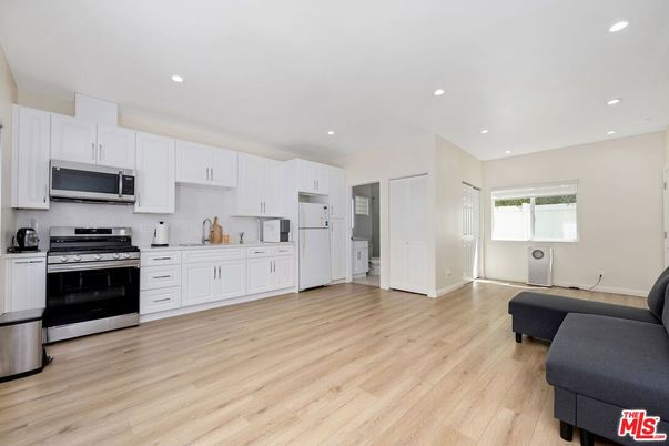 Interior, Kitchen, Recessed Lighting, Stainless Steel Appliances, Wood Texture Flooring
