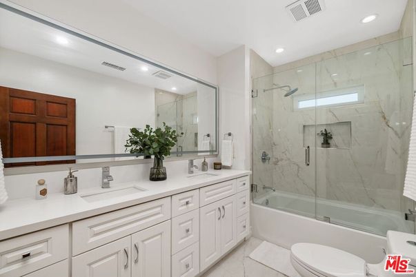 Bathroom, Dual Sink Vanities, Glass Shower, Interior, Marble Walls, Recessed Lighting