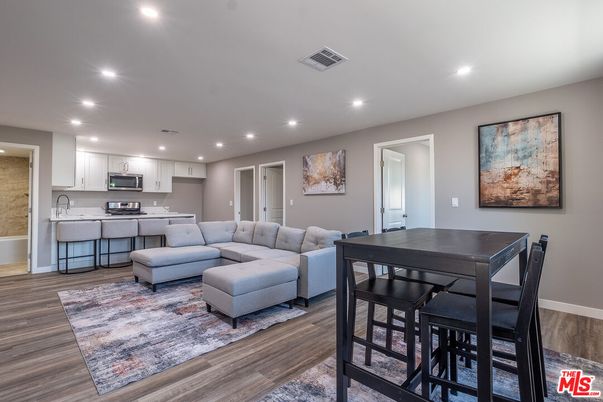 Dining room, Interior, Kitchen, Recessed Lighting, Stainless Steel Appliances, Wood Texture Flooring