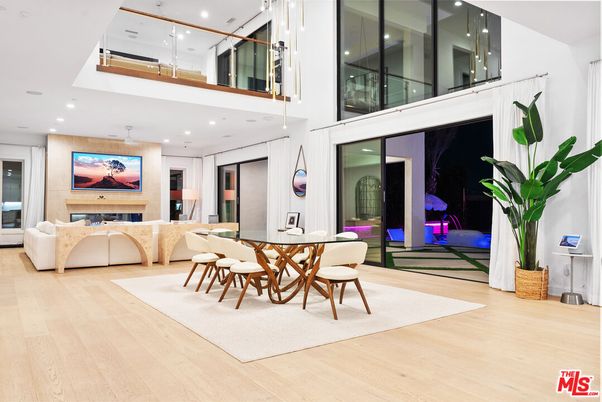 Dining room, Fireplace, Interior, Living room, Recessed Lighting, Wood Texture Flooring