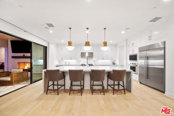 Fireplace, Interior, Kitchen, Pendant Lights, Recessed Lighting, Stainless Steel Appliances, Wood Texture Flooring