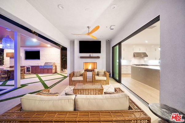 Fireplace, Interior, Kitchen, Living room, Recessed Lighting, Stone Walls, Wood Texture Flooring