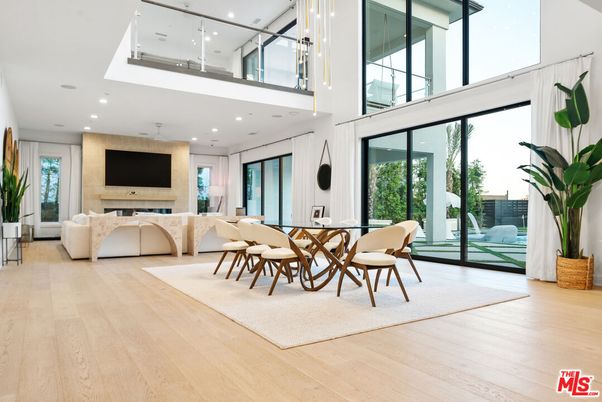 Dining room, Fireplace, Interior, Living room, Recessed Lighting, Wood Texture Flooring