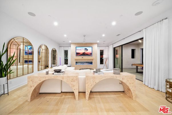 Fireplace, Game Room, Interior, Living room, Recessed Lighting, Wood Texture Flooring