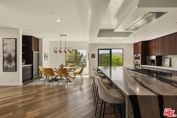 Dining room, Interior, Kitchen, Pendant Lights, Recessed Lighting, Stainless Steel Appliances, Wood Texture Flooring