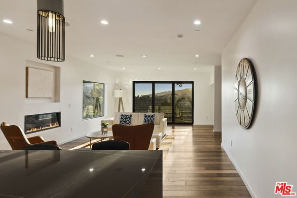 Fireplace, Interior, Living room, Recessed Lighting, Wood Texture Flooring