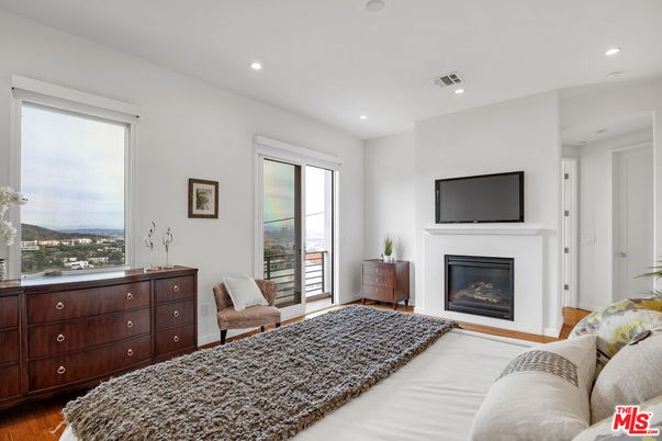 Bedroom, Fireplace, Interior, Recessed Lighting, Wood Texture Flooring