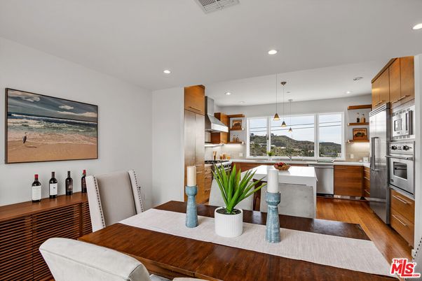Dining room, Interior, Kitchen, Pendant Lights, Recessed Lighting, Stainless Steel Appliances, Wood Texture Flooring