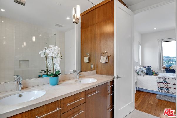 Bathroom, Dual Sink Vanities, Glass Shower, Interior, Recessed Lighting, Wood Texture Flooring