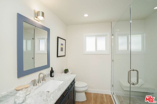 Bathroom, Glass Shower, Interior, Recessed Lighting, Wood Texture Flooring