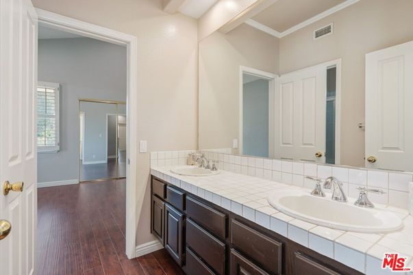 Bathroom, Dual Sink Vanities, Interior, Tile Countertops, Wood Texture Flooring