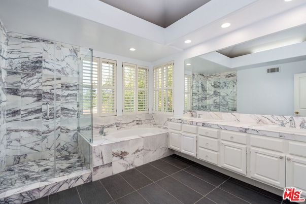 Bathroom, Dual Sink Vanities, Glass Shower, Interior, Marble, Marble Walls, Recessed Lighting