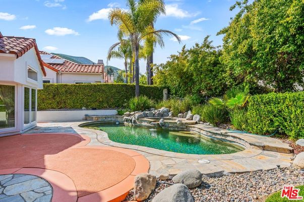 Exterior, Pool, Solar Panels