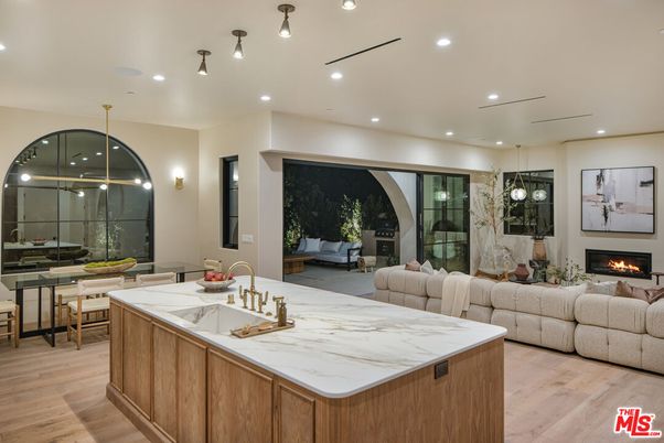 Dining room, Fireplace, Interior, Living room, Pendant Lights, Recessed Lighting, Wood Texture Flooring