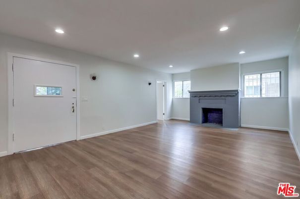 Empty room, Fireplace, Interior, Recessed Lighting, Wood Texture Flooring