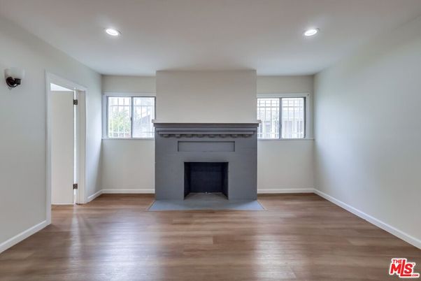 Empty room, Fireplace, Interior, Recessed Lighting, Wood Texture Flooring