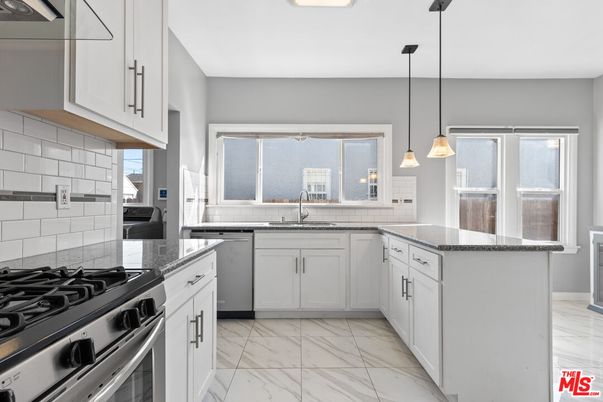 Interior, Kitchen, Marble, Pendant Lights, Stainless Steel Appliances