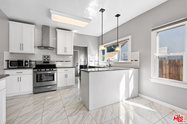 Interior, Kitchen, Marble, Pendant Lights, Stainless Steel Appliances