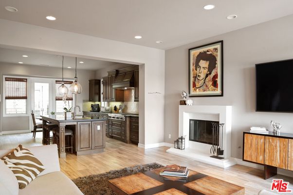 Dining room, Fireplace, Interior, Kitchen, Living room, Pendant Lights, Recessed Lighting, Stainless Steel Appliances, Wood Texture Flooring