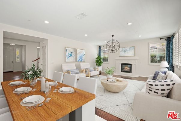 Chandelier, Dining room, Fireplace, Interior, Living room, Recessed Lighting, Wood Texture Flooring
