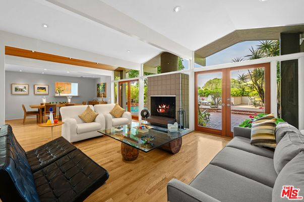 Dining room, Fireplace, Interior, Living room, Recessed Lighting, Wood Texture Flooring