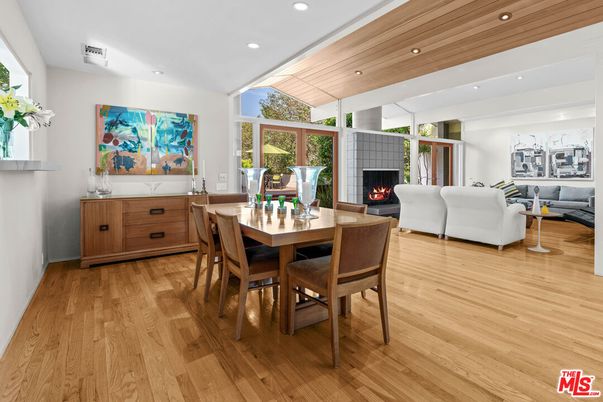 Dining room, Fireplace, Interior, Living room, Recessed Lighting, Wood Texture Flooring