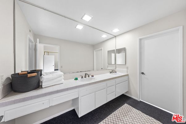 Bathroom, Dual Sink Vanities, Interior, Recessed Lighting, Tile Countertops