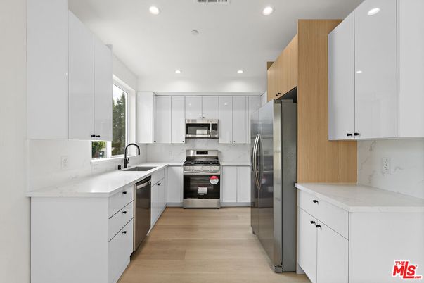 Interior, Kitchen, Recessed Lighting, Stainless Steel Appliances, Wood Texture Flooring