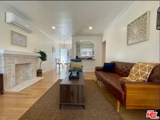 Dining room, Fireplace, Interior, Living room, Pendant Lights, Recessed Lighting, Wood Texture Flooring