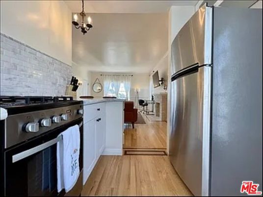 Chandelier, Interior, Kitchen, Living room, Pendant Lights, Stainless Steel Appliances, Wood Texture Flooring