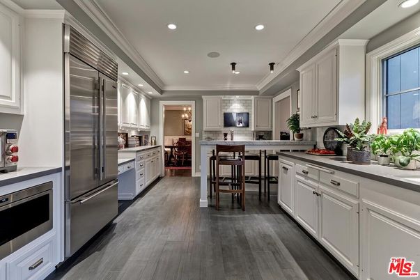 Dining room, Interior, Kitchen, Recessed Lighting, Stainless Steel Appliances, Wood Texture Flooring