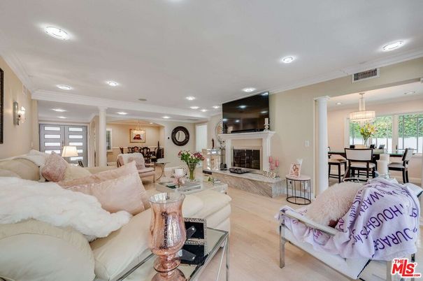 Chandelier, Dining room, Fireplace, Interior, Living room, Pendant Lights, Recessed Lighting, Wood Texture Flooring