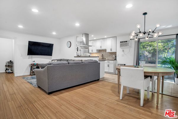 Dining room, Interior, Kitchen, Living room, Pendant Lights, Recessed Lighting, Stainless Steel Appliances, Wood Texture Flooring