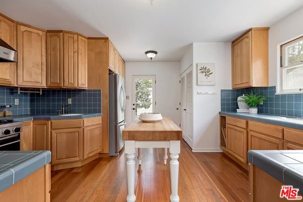 Interior, Kitchen, Tile Countertops, Wood Texture Flooring