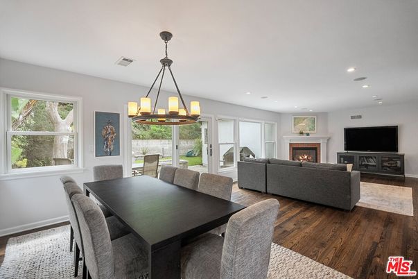 Chandelier, Dining room, Fireplace, Interior, Living room, Recessed Lighting, Wood Texture Flooring