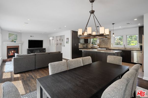 Dining room, Fireplace, Interior, Kitchen, Living room, Pendant Lights, Recessed Lighting, Stainless Steel Appliances, Wood Texture Flooring